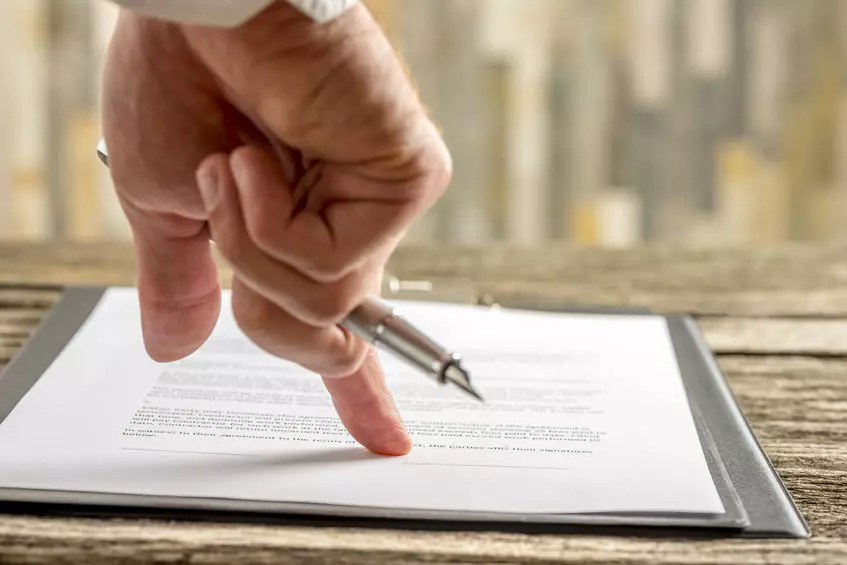 Family meeting with legal advisor, showing when a Will is crucial—highlighting Trusted Will Writing Chertsey for essential life planning.